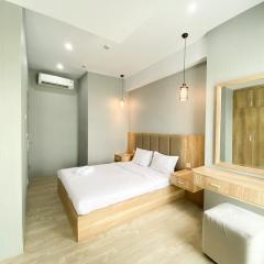 Simply Look and Comfort 1BR Vasanta Innopark Apartment By Travelio