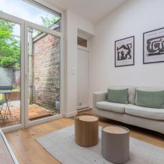 Appartement une chambre avec jardin, proche tram