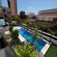 Air-conditioned Elisa Apartment with spacious sunroof lounge and swimming pool