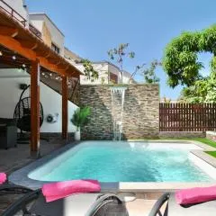 Villa Puerto Rico in front of the shopping center with private heated saltwater pool with jacuzzi & arcade games