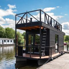 Tiny-Hausboot LIKEDEELER mit Dachterasse und Kamin