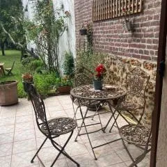 Studio avec terrasse sur jardin