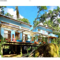 Quartos em sítio exuberante