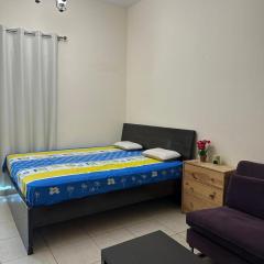 Private room with balcony fully furnished in Dubai Silicon Oasis