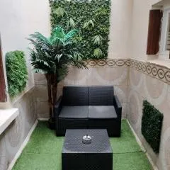 Appartement cosy avec patio en RDC