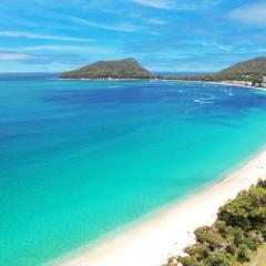 Serenity Sands where calms seas, soft breezes and pure relaxation awaits.