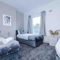 Comfy four bedroom house with parking