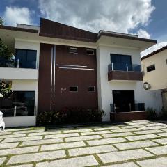 Apartamento confortável ao lado da arena axé moi 3min da praia