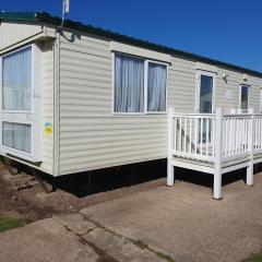 Sealands Everglade II:- 6 Berth, Central Heated Access to the beach