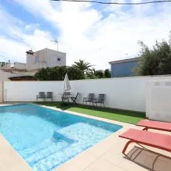 2 apartamentos en una excelente villa de playa compartiendo Piscina y Jardín