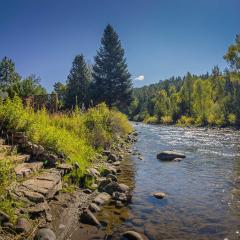 Riverfront Home with Hot Tub about 19 Mi to Wolf Creek!