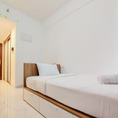 Homey and Warm Studio Room at Sky House BSD Apartment By Travelio