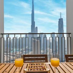 Chic 4 Bedroom Apartment I Burj Khalifa & Fountain Views I Direct Access to Dubai Mall I Free Gym, Pool, Parking Wi-Fi and PS5 I by Skyline Serenity