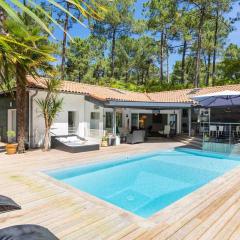 Villa d'architecte avec piscine chauffée et borne de recharge, parfaite pour des vacances en famille - FR-1-791-4