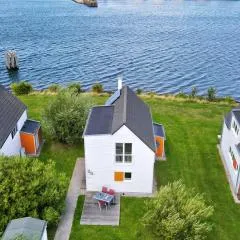 Ferienhaus An der Ostsee by Seeblick Ferien ORO, direkte Wasserlage,Sauna, E-Säule
