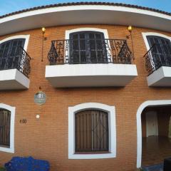 Extensão Black - Ipê Rosa Hotel