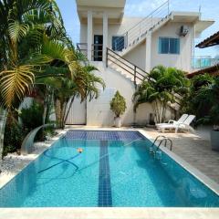 Casa com PISCINA centro de Prado