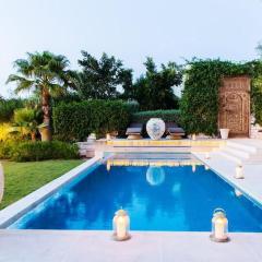 Villa luxeuse et climatisee sur le golf, piscine chauffee