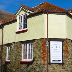 The Old Stores, a Grade II listed cottage in the delightful village of Georgeham, is ideal for beach, surfing, walking & cycling holidays