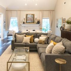 Sink into the Luxe Corner Tub at an Upscale, Spacious Home