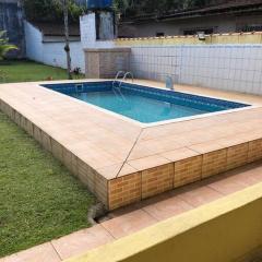 Casa com Piscina em Peruíbe