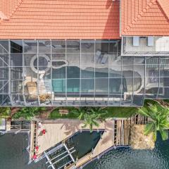 JUST WOW!! Experience Luxury! Gulf Access, Pool & Spa, Dock, Tiki- Villa Waterfront Wonderland