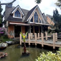 Villa puncak bogor at kota bunga ada karoke & AC