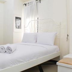 White and Nice 1BR at Bassura City Apartment By Travelio