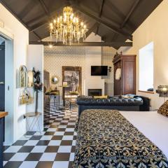 La Suite Años 20 Bañera, chimenea y terraza
