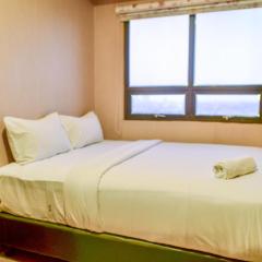 Nice and Cozy 2BR Apartment at Atria Residence Gading Serpong By Travelio