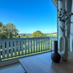 Bovenappartement in Winterberg met balkon en uitzicht over het bos