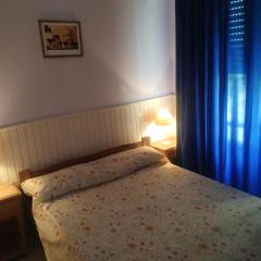 Departamento 4 personas en edificio frente al mar