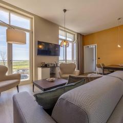 Wellenreiter - 5-Sterne Ferienwohnung mit Südbalkon und Boddenblick
