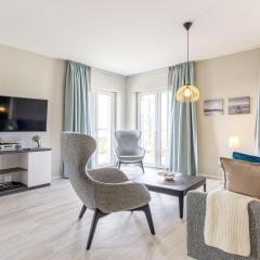 5 Sterne Ferienwohnung Boddenkieker mit großer Eckterrasse und Boddenblick