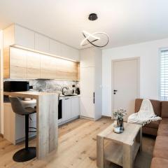 ALURE RESIDENCES 9 & 24h self check-in, private parking in front of the apartment building included, new building, terrace, the apartment building has its own park with a lake and outdoor fitness, children's playground, CITY CENTER