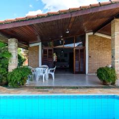 BH4 · BH4: CASA COM PISCINA AO LADO DA PRAIA GRANDE