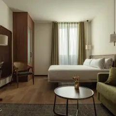 Batimont Suites & Apartments