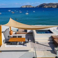 Theasis Beachfront Villa with Terrace seconds from the Beach by Hospi
