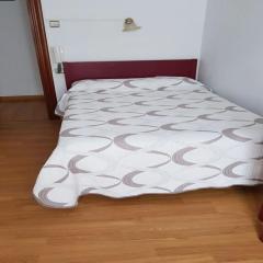 Cozy single room with shared bathroom