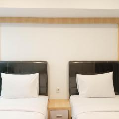 Homey Studio at De Prima Apartment By Travelio