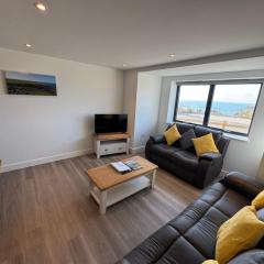 Camelot House 1 Bed Apartment with Sea views