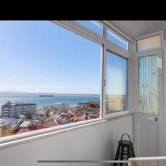 Charmoso apartamento com vista rio
