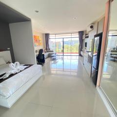 Stunning 60 sqm Studio at NaiHarn Beach Condo, Walk to Beach, Your Tropical Retreat!