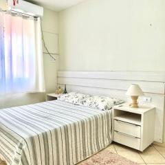 Quarto em apto compartilhado com anfitrião