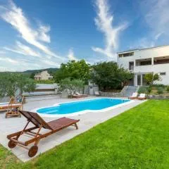 Serene Rural Villa with Pool, Sun Deck, and Children's Play Area
