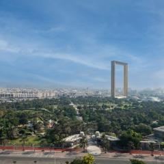 Elegant 2-Bed Escape with Dubai Frame & DIFC Views