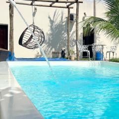 A Casa Paradisíaca ll Luxo Piscina Super Mega Quente até 50 graus Aquecimento Elétrico e Solar Casa com Sauna a Vapor e Ar Condicionado em Todos Ambientes e Lavanderia com Roupa de Cama e Banho