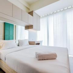 Cozy Stay Studio at Tree Park City BSD Apartment By Travelio