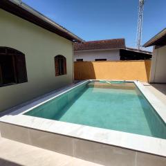 Casa piscina com ozônio churrasqueira perto da praia