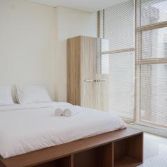 Comfort and High Floor Studio at Brooklyn Alam Sutera Apartment By Travelio